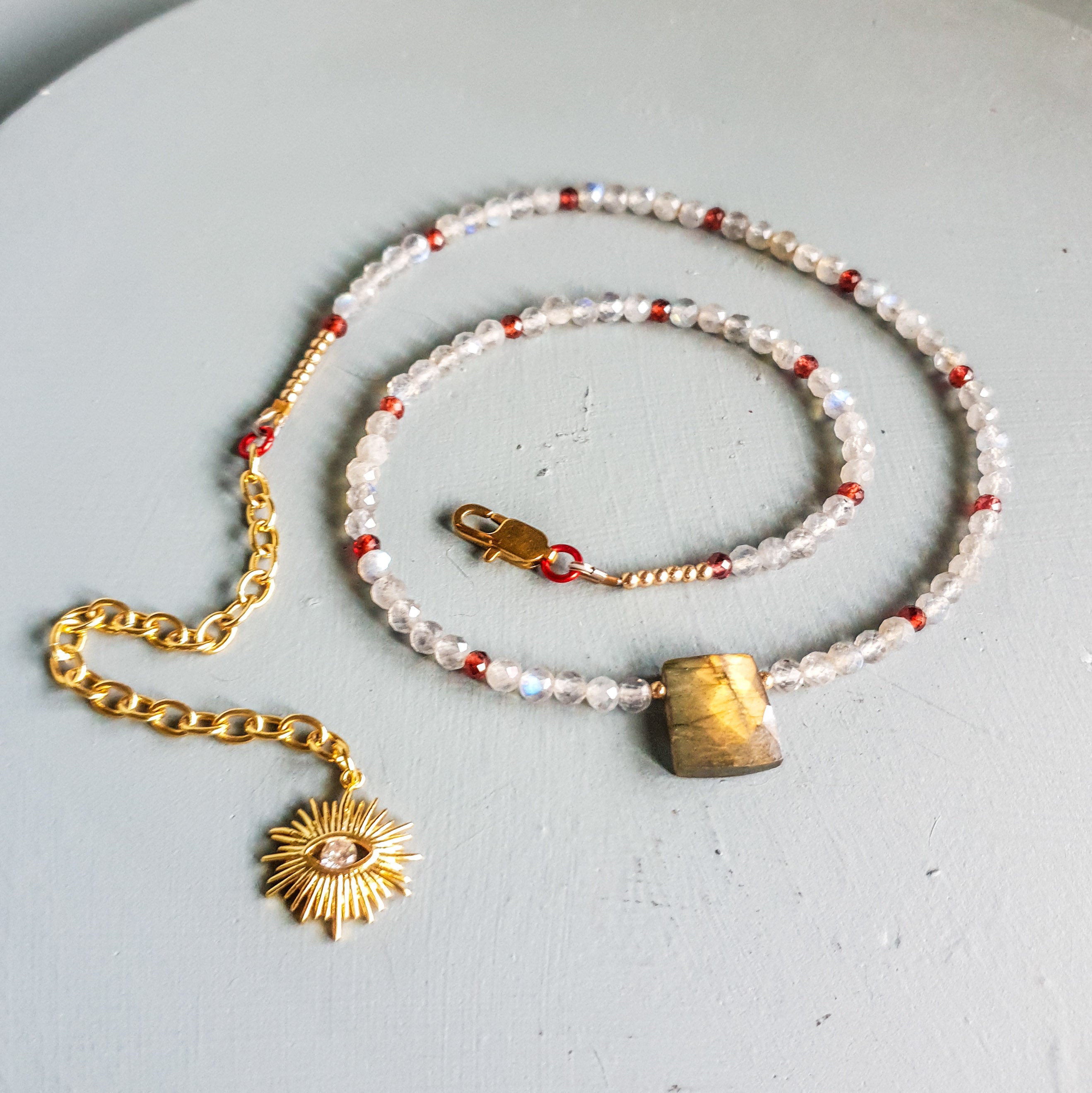 Golden Flash Labradorite Centrepiece Necklace with Labradorite, Garnet & Evil Eye Charm
