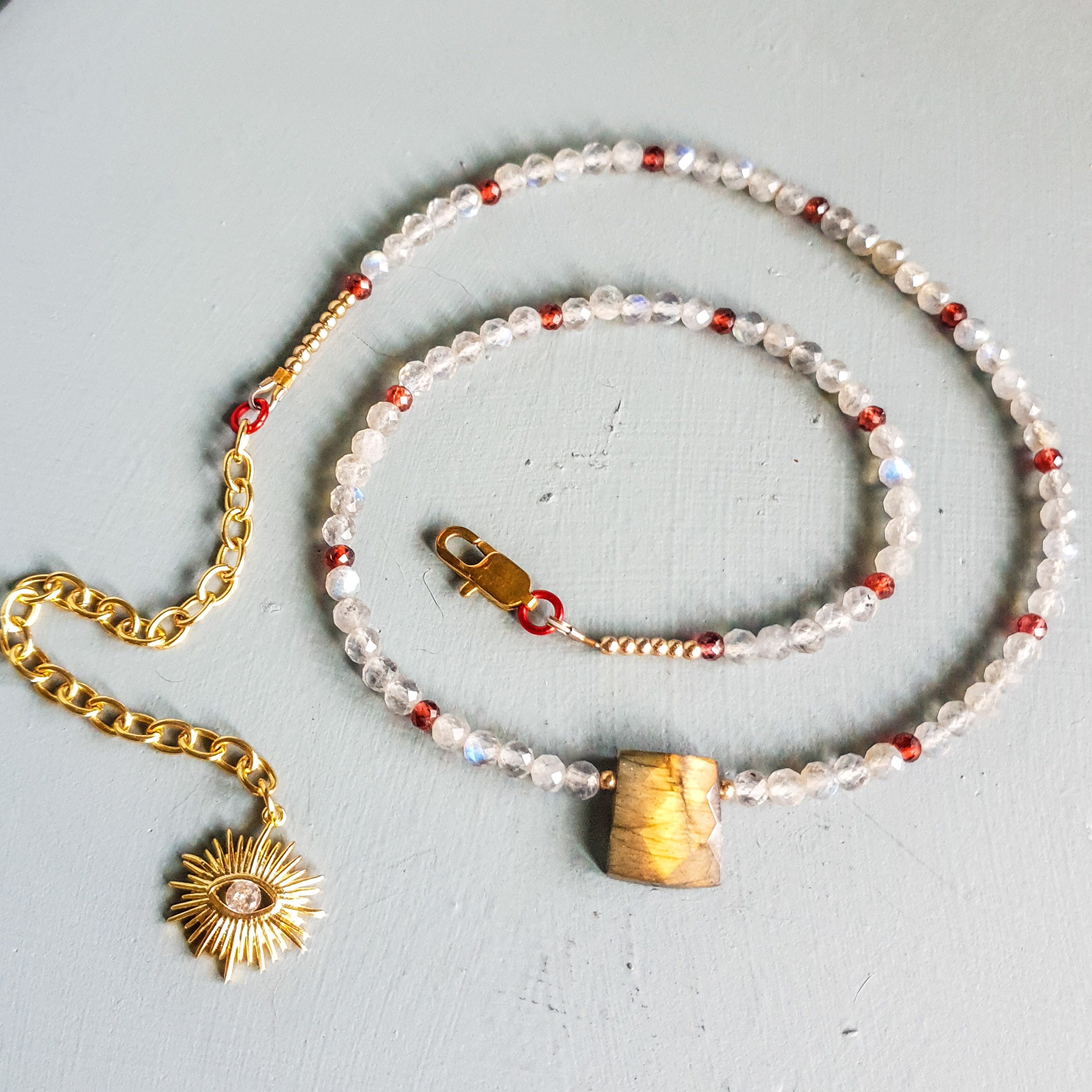 Golden Flash Labradorite Centrepiece Necklace with Labradorite, Garnet & Evil Eye Charm