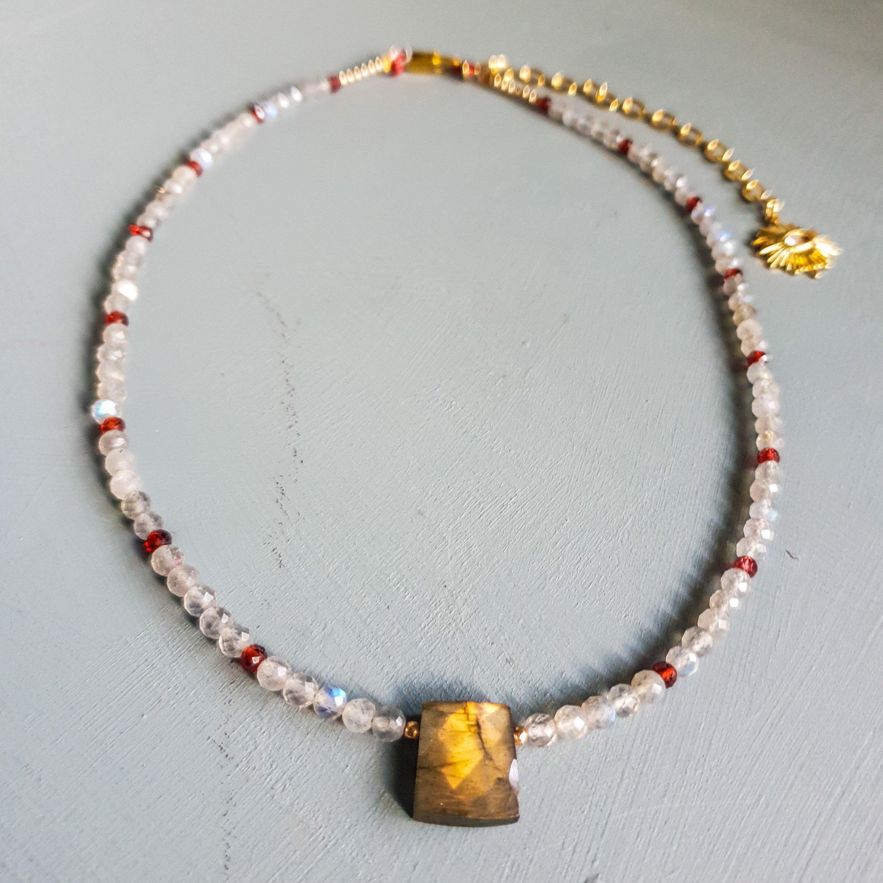 Golden Flash Labradorite Centrepiece Necklace with Labradorite, Garnet & Evil Eye Charm
