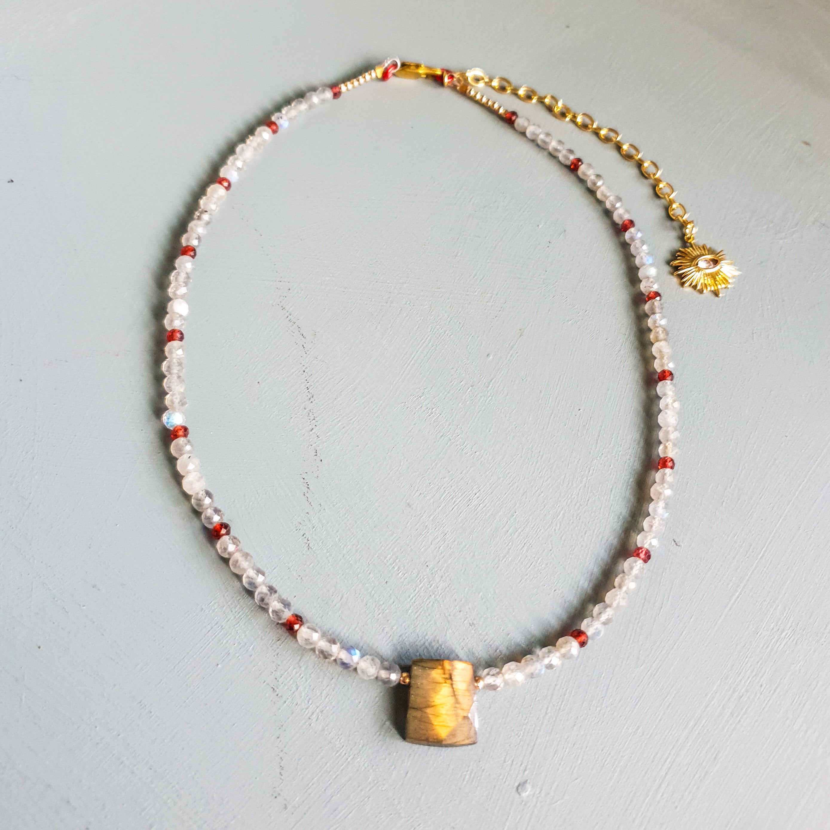 Golden Flash Labradorite Centrepiece Necklace with Labradorite, Garnet & Evil Eye Charm